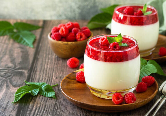 Raspberry Panna cotta with raspberry jelly, Italian dessert, homemade cuisine. Copy space.