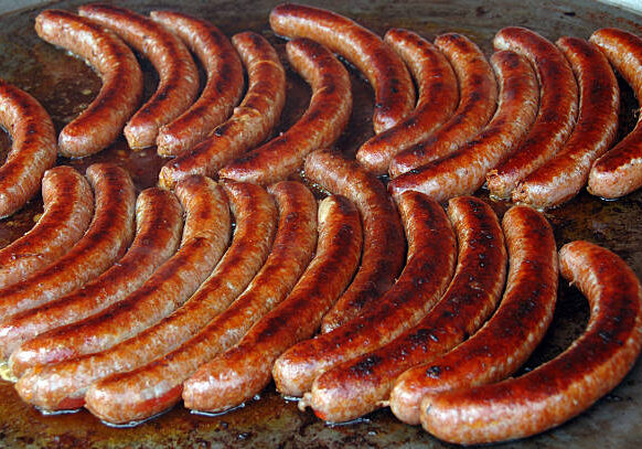 roasted sausages on a barbecue grill