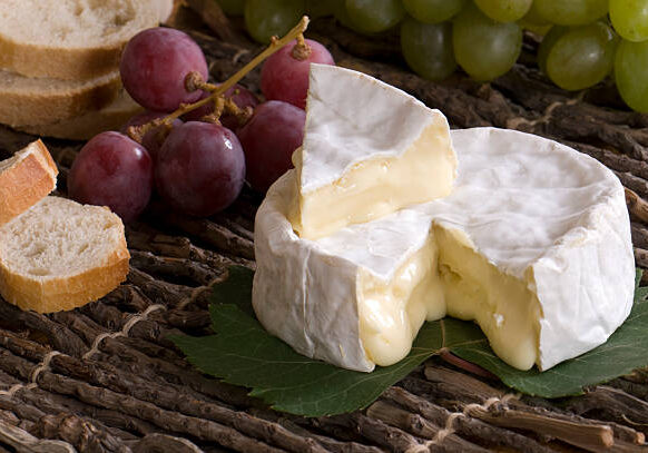 "French cheese, bread and grapes"