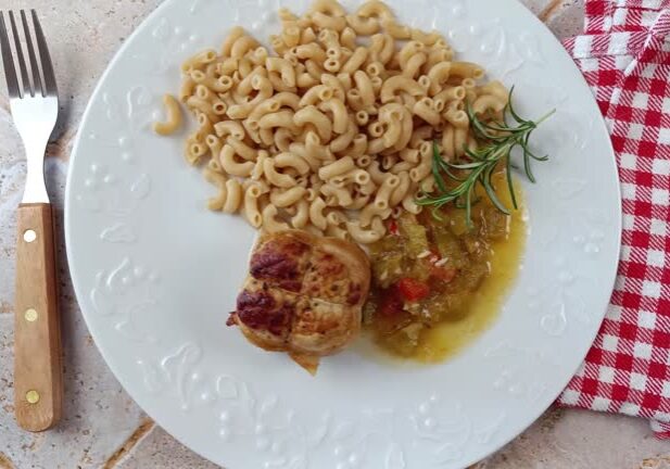 meat paupiette and whole wheat pasta close-up