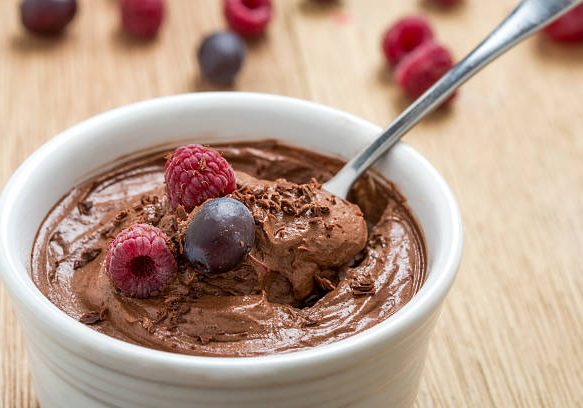 Chocolate mousses topped with berries